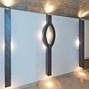 Cavendish Green, Gewölberaum aus Furnierstein. Decke rund gearbeitet, mit Designlampen aus Furnierstein-Blue Orchid – Design: Jan Allers.